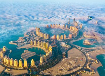 Aerial view of the Pearl-Qatar island in Doha through the morning fog - Qatar, the Persian Gulf