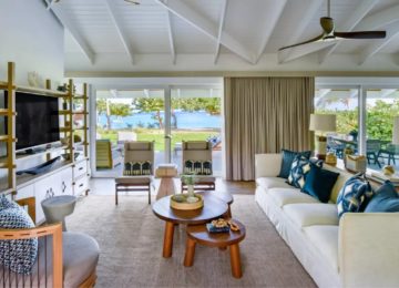 Living area with a view of the beach ©Rosewood Little Dix Bay